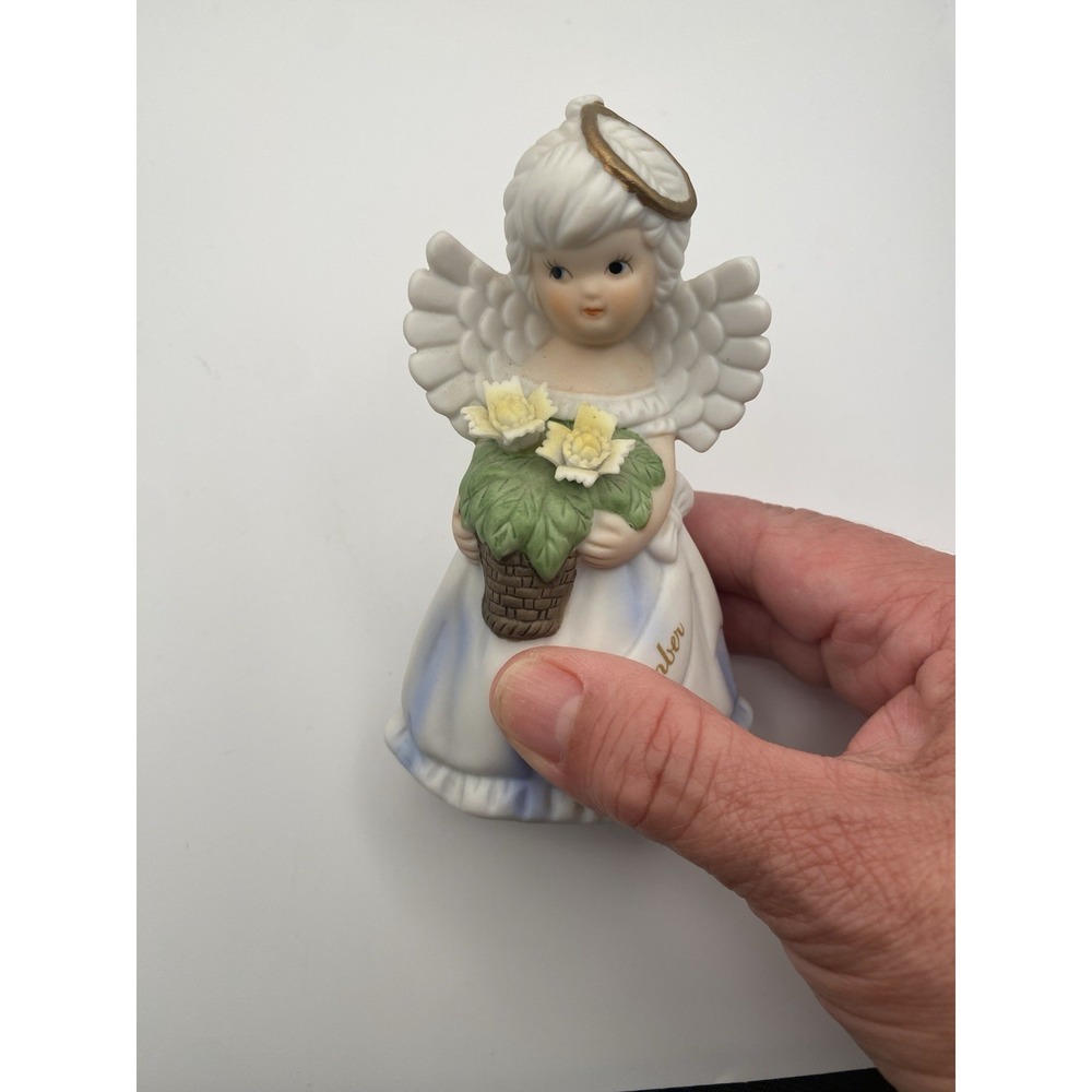 Brinn's Porcelain Bisque  September Birthday Angel With Flowers